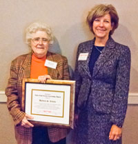 Barbara S. Rivette (left) receives the CNY&nbsp;RPDB's Rhea Eckel Clark Citizenship Award from Board Chairwoman Kathleen A. Rapp at the Board's 2014 Annual Meeting